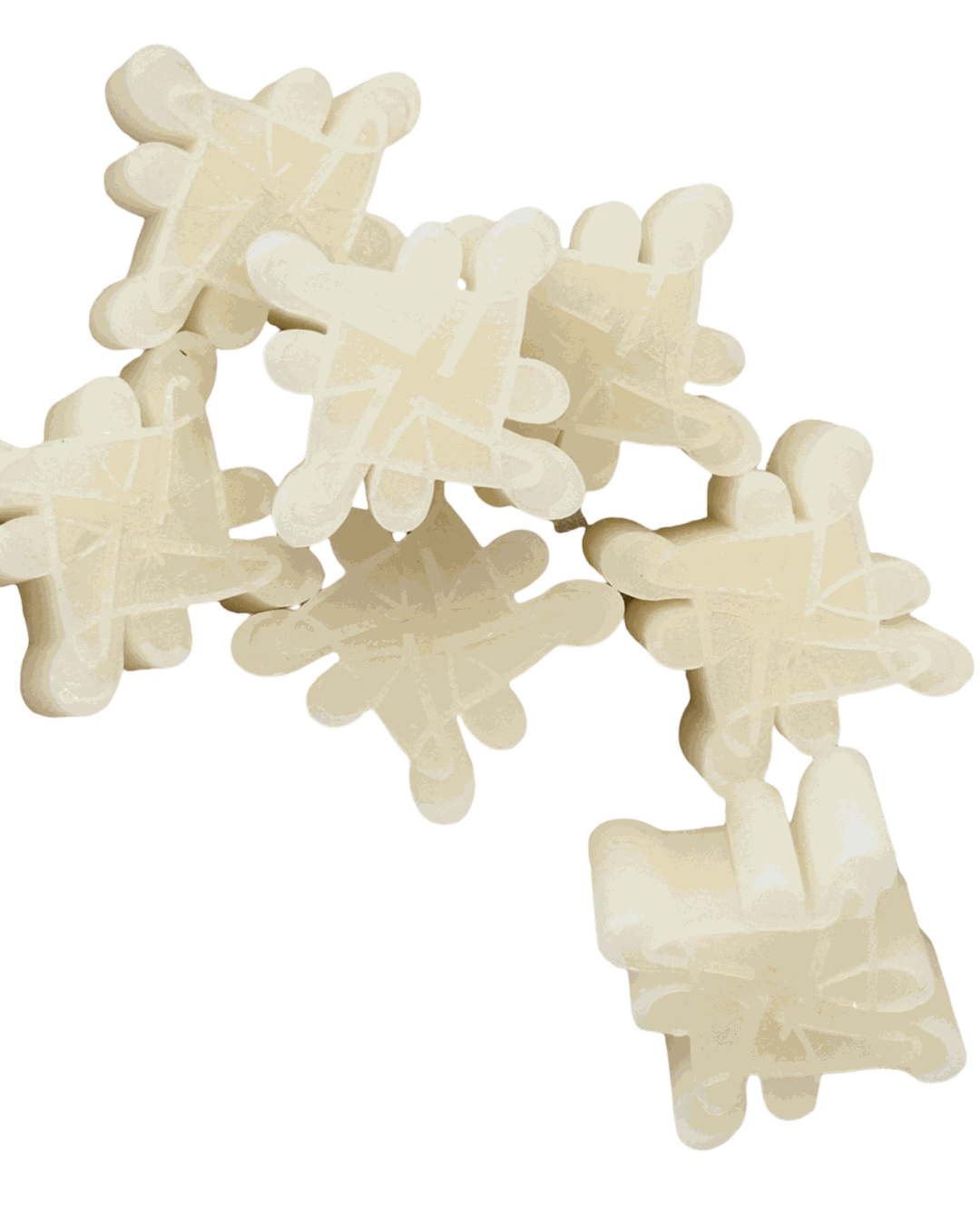 Frosted Waters Massage Wax Melts in snowflake shapes with sea-inspired and herbal fragrance blend