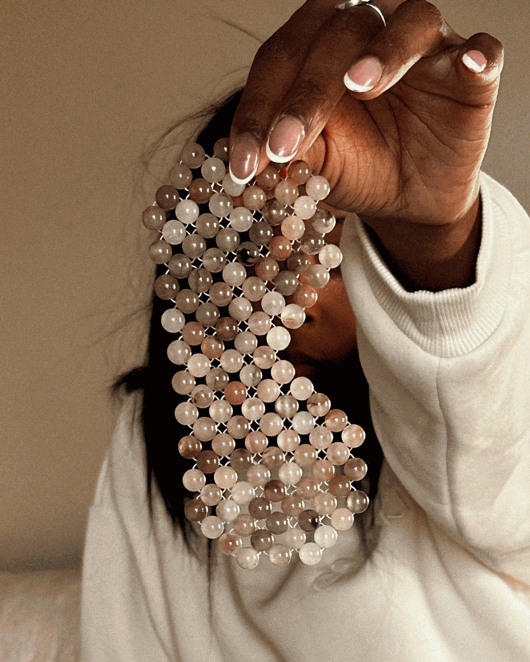 natural jade stone eye mask held by a person